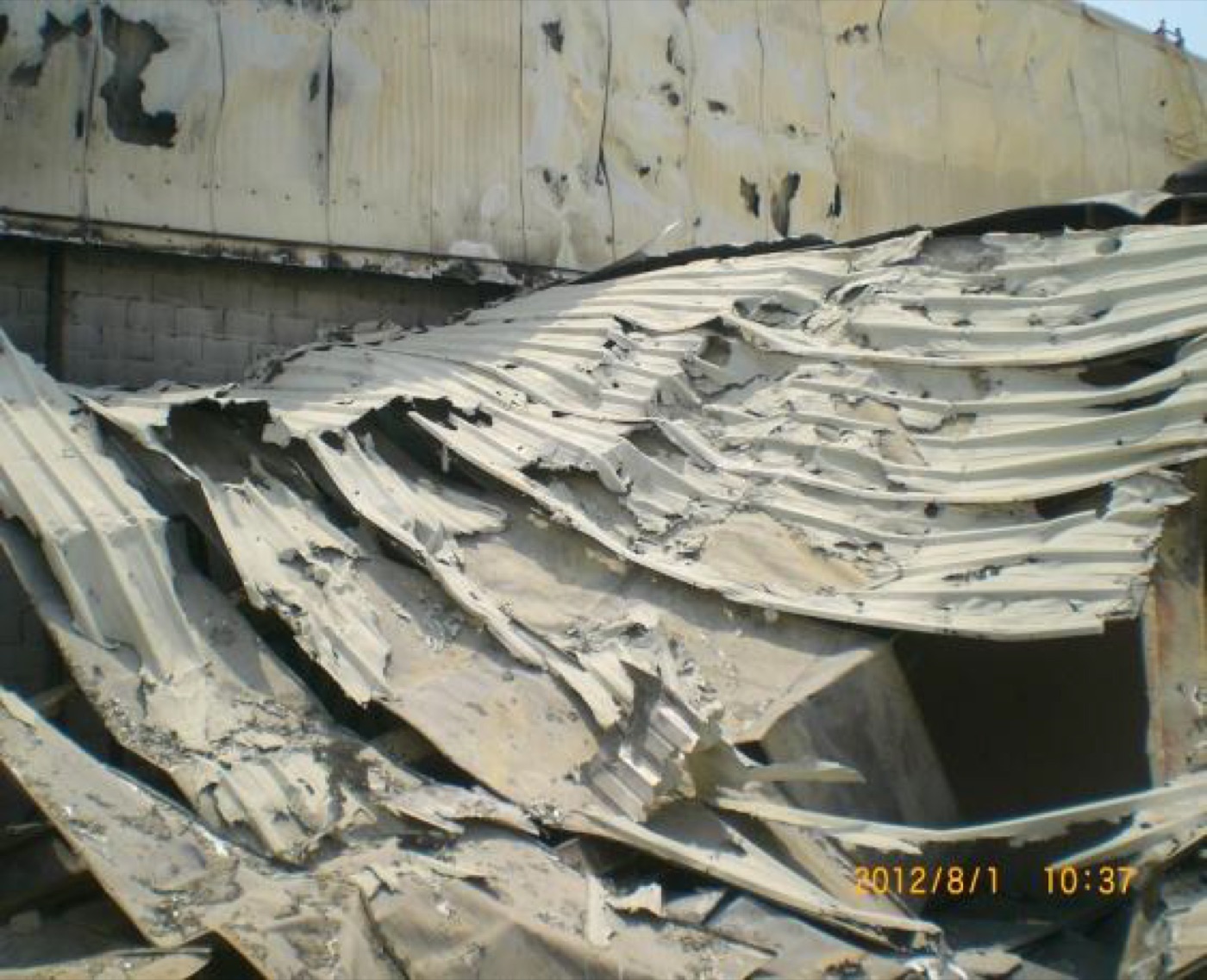 Fire-damaged concrete structure inside a mall